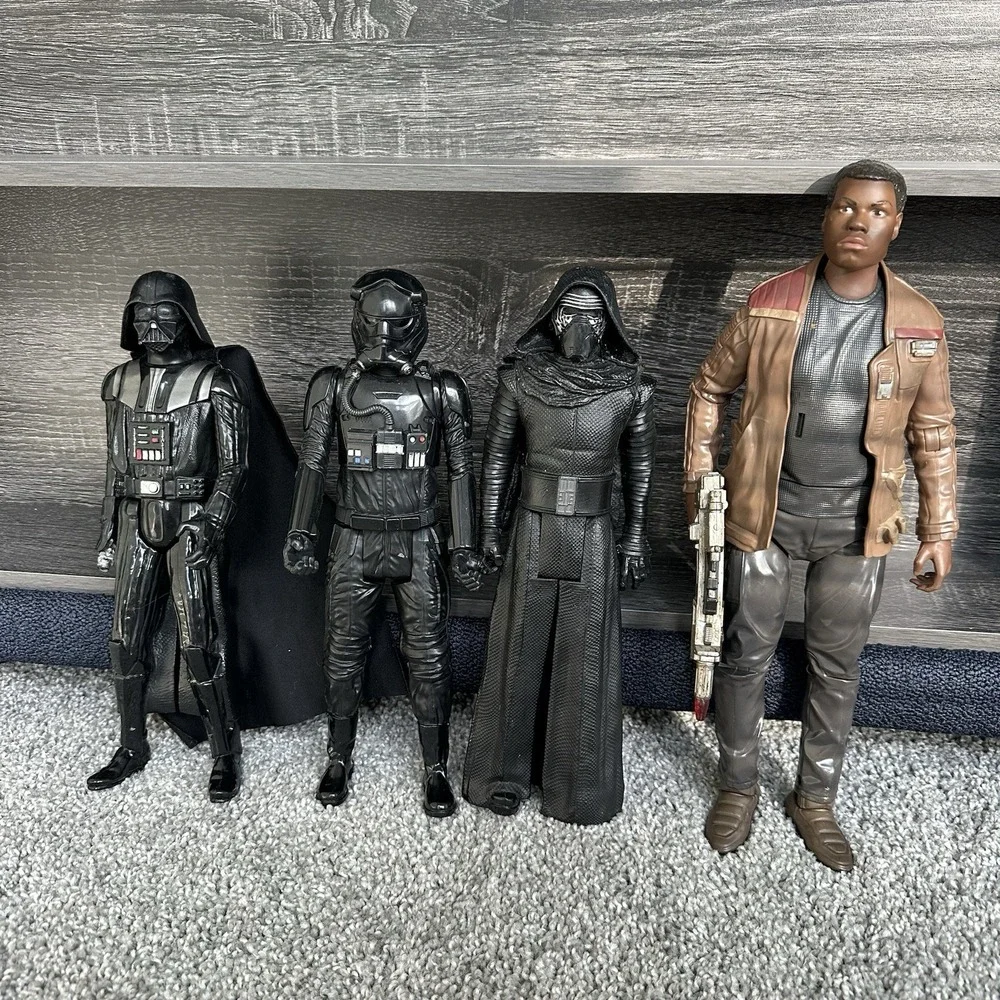 Star Wars action figures Darth Vader, a TIE Fighter Pilot, Kylo Ren, and Finn